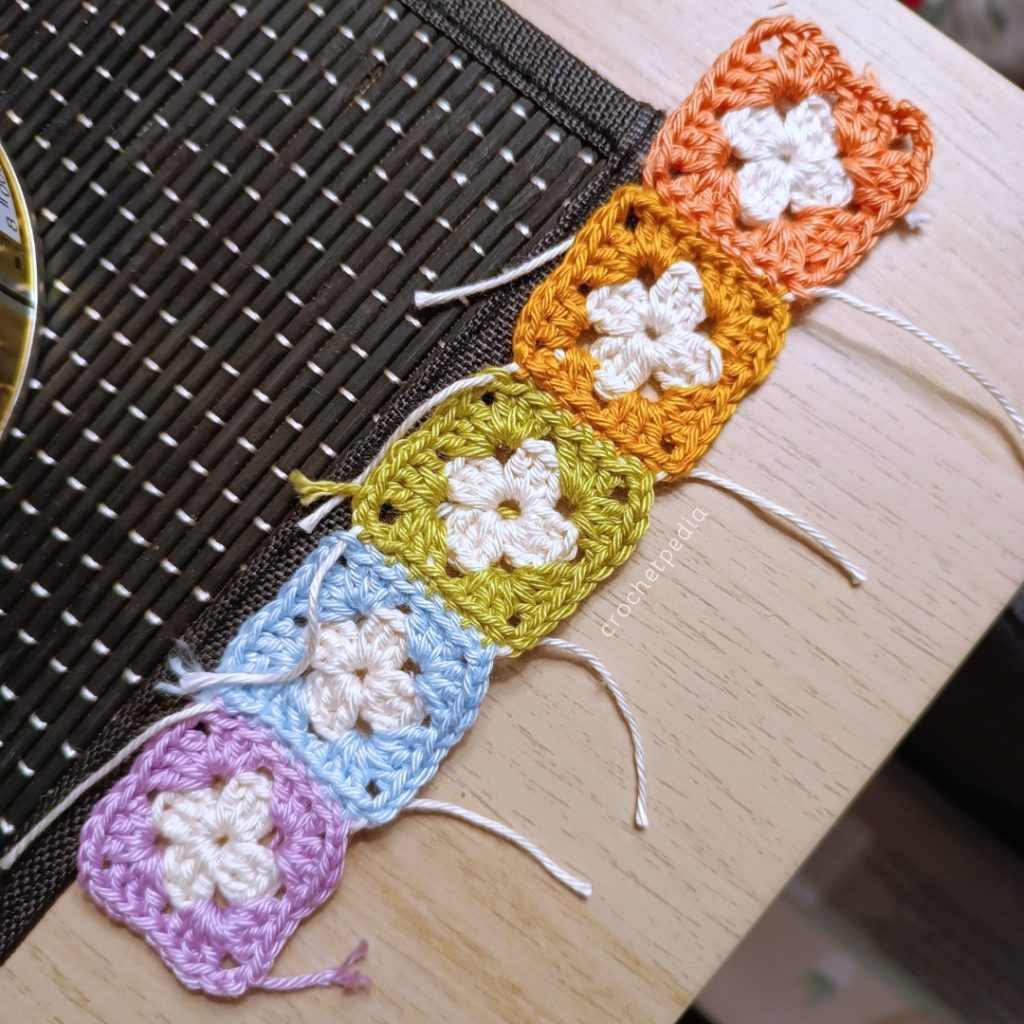 Joining the squares with mattress stitch.